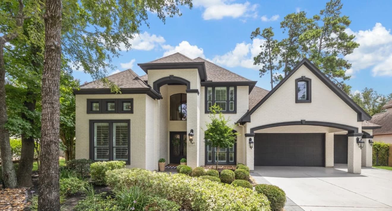 Front exterior of large two-story modern-style home