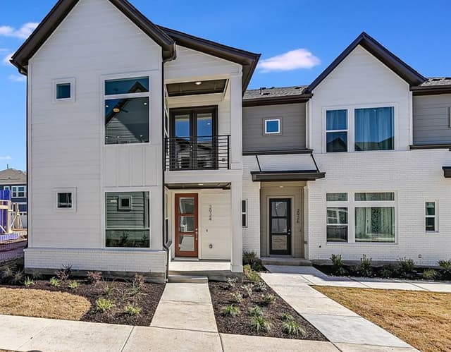 Front view of modern duplex with clean contemporary design