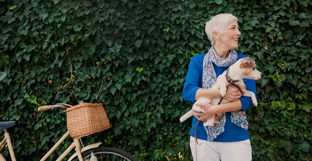 Lady with bike and dog - Final expense insurance protection